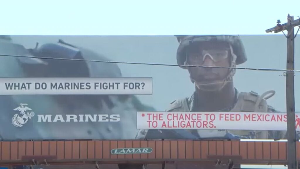 Marine Corps Billboard Defaced By Pro-Illegal Group