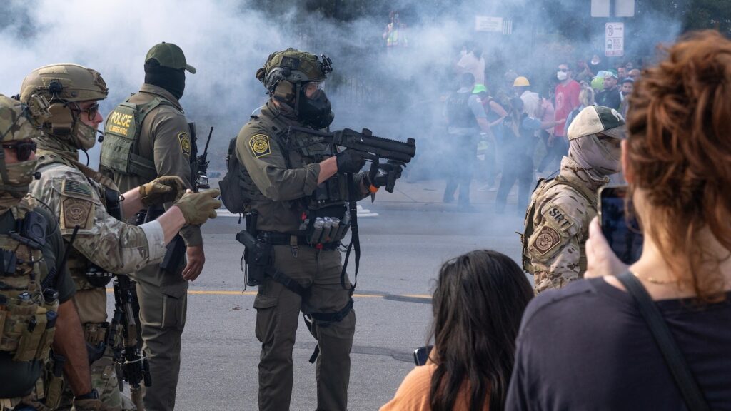 Trump threatens use of Insurrection Act in Chicago as governor says feds used Black Hawk helicopters in immigration raid